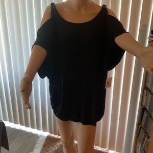 Michael Kor’s open sleeve top with buckle top sleeve